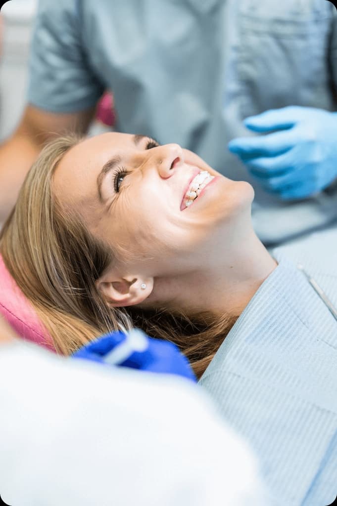 A patient smiling at a dental appointment